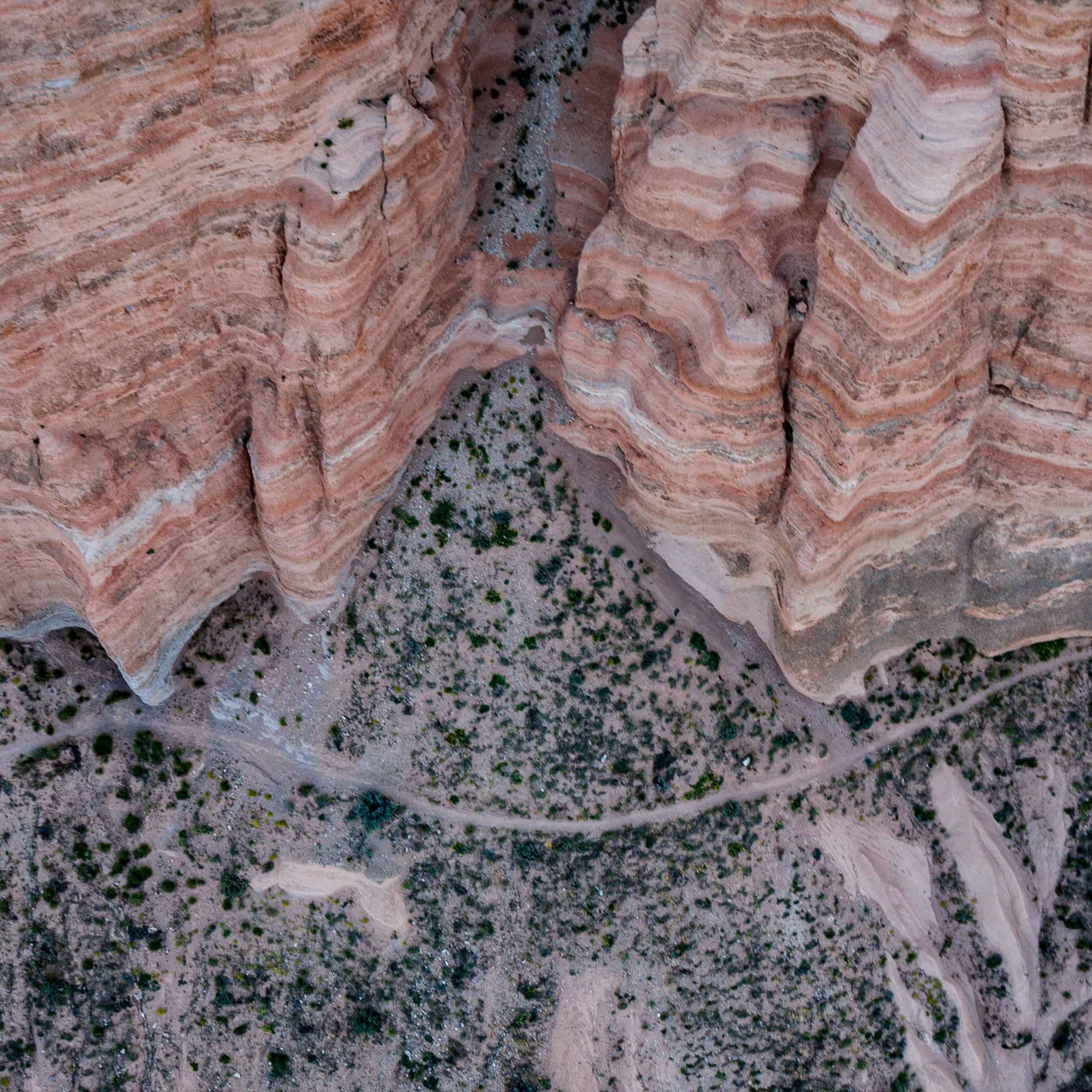 Hiking path below the towering rock formations of Cappadocia 