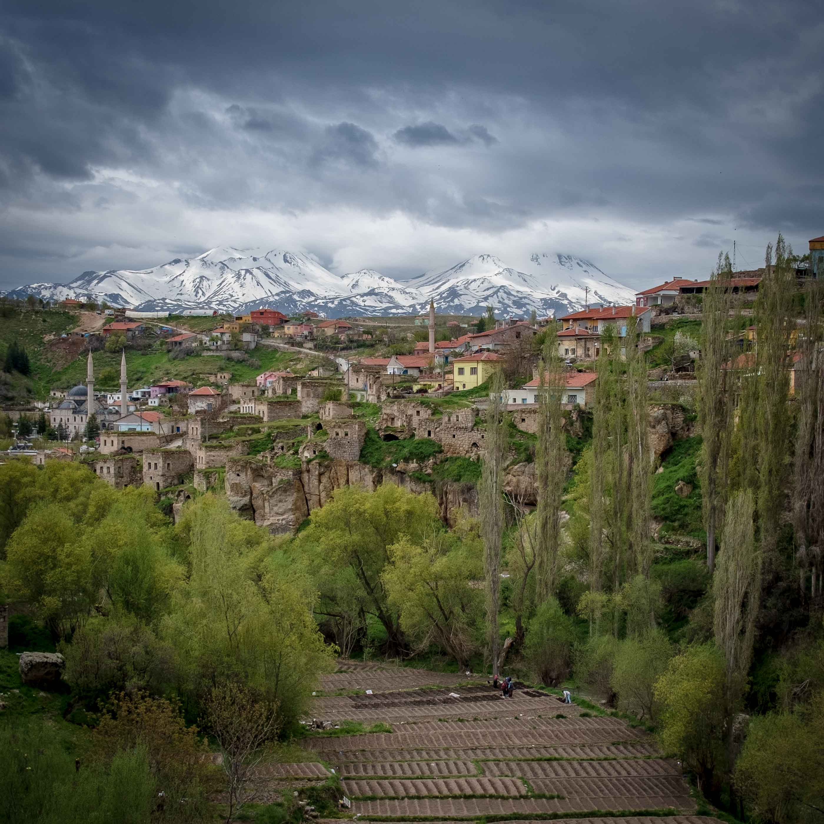 View of Ihlara Village with snowy Mt Hasan in the background 